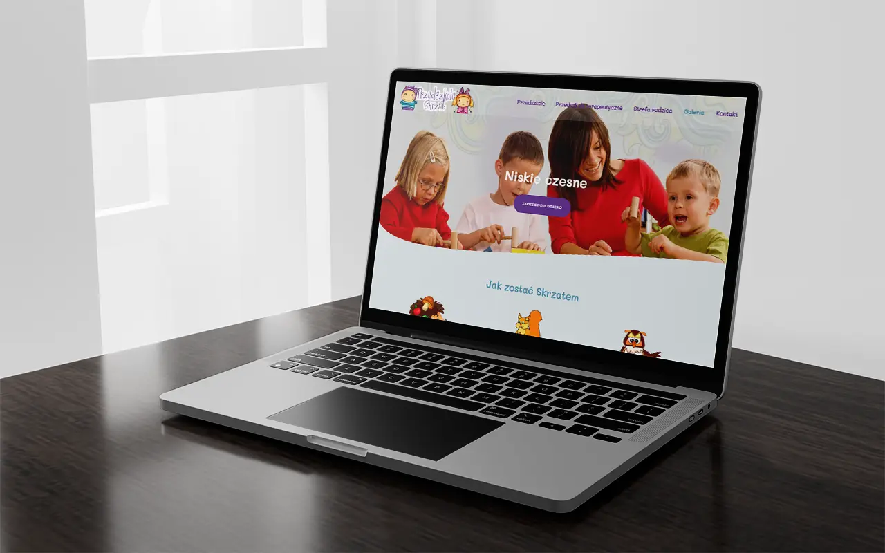 Strona internetowa przedszkola Skrzat w Lublinie wyświetlona na laptopie
